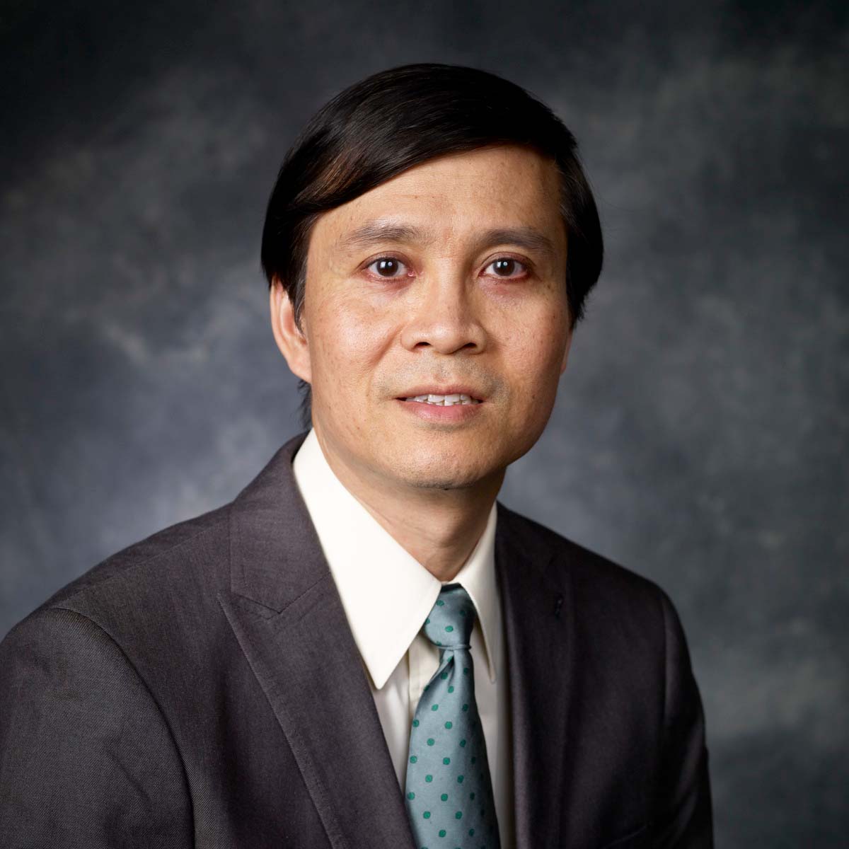 Headshot for Dr. Eric Tsang